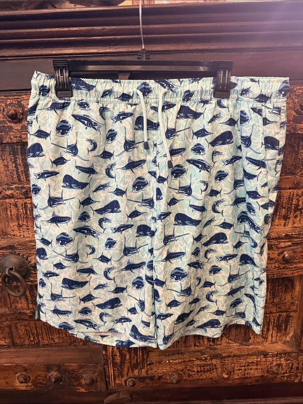 Peter Millar Light Blue Swim Trunks with Navy Fish Print